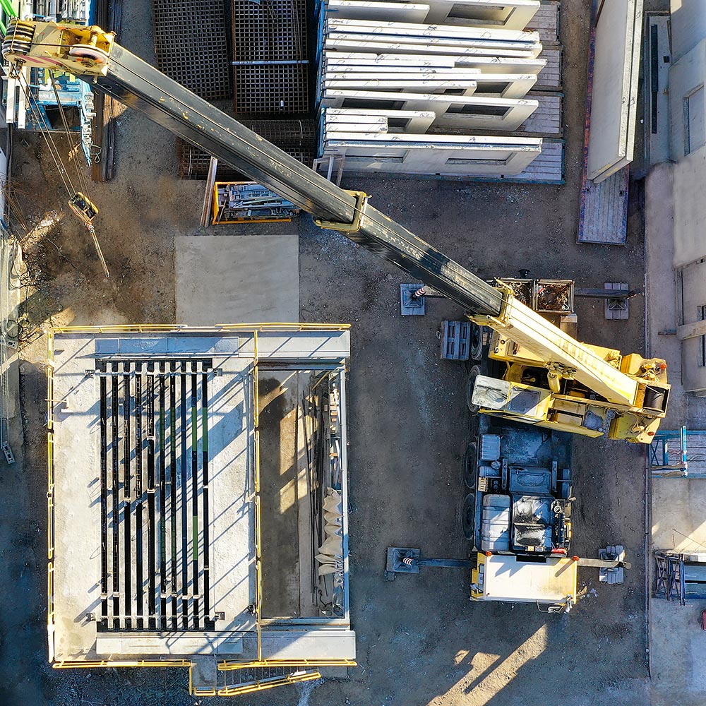 WMT M7 with construction crane on a construction site